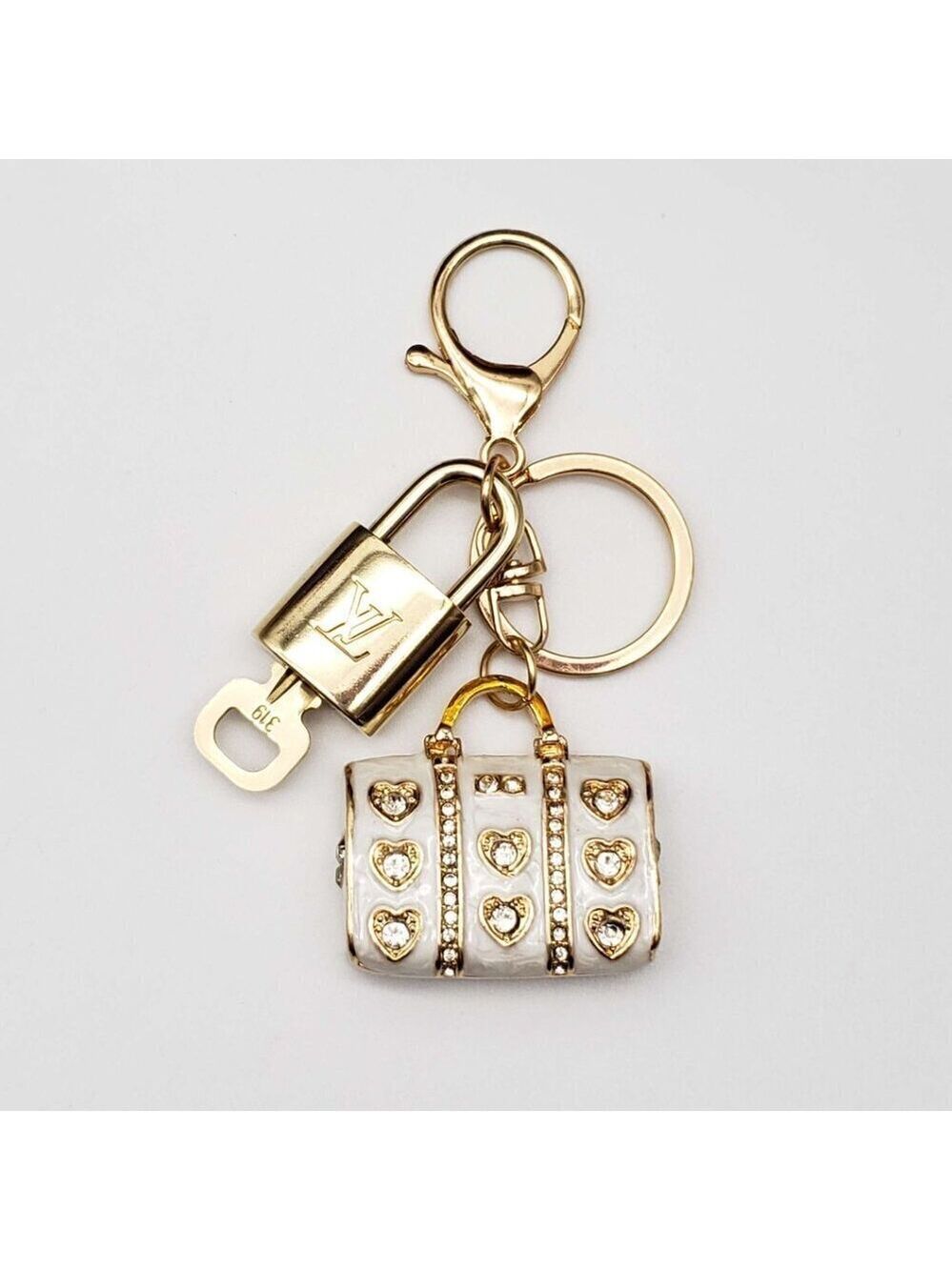 100% Auth Louis Vuitton Lock & Key with unbranded Bagcharm, Keycharm, Keychain